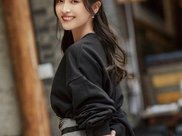 一位居家主妇，打扮干净利落，气质不错！