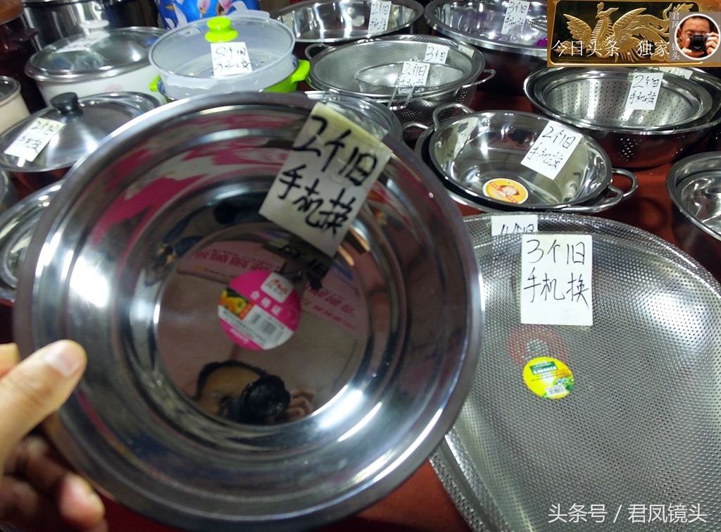 北宜昌:商家用不锈钢盆装满数百个废旧手机!干