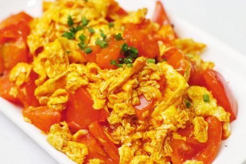 番茄炒鸡蛋,一分钟快手菜,汤汁浸入鸡蛋,色泽诱