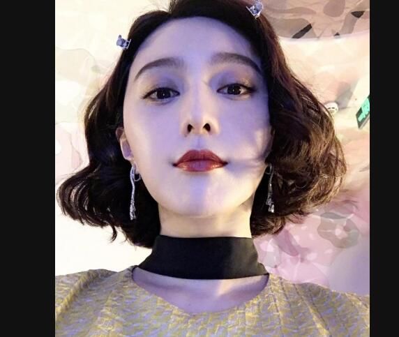 手机2造型曝光!范冰冰武月短卷发惊艳 头发上