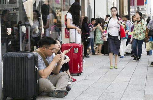 日本游客:拿5万日元换成3000元人民币,能