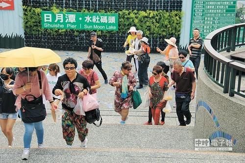 日月谈:搞丢了陆客大蛋糕,却硬拗台湾不饿